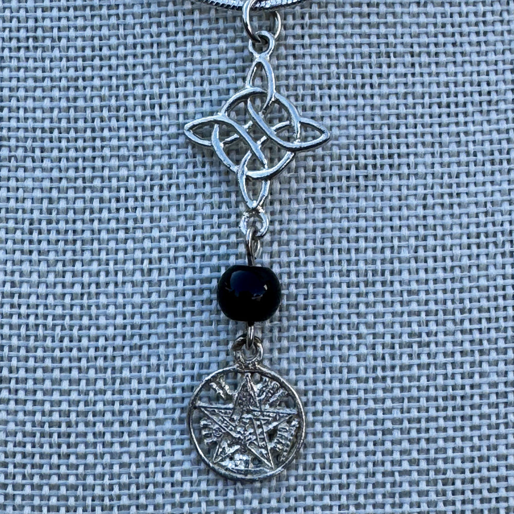 Amuleto Doble Protección Plata 925 con Ónix Negro, Nudo de Bruja y Tetragramatón (Activado) | Magicka Shop SKU AMUL-DOBPROT-ONIX-PLATA