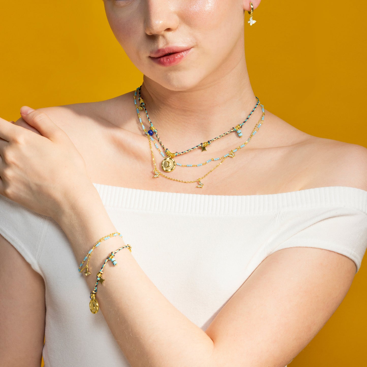 Pulsera con Cristal Azul Oscuro acabado oro 18k - Liskel