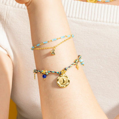 Pulsera con Cristal Azul Oscuro acabado oro 18k - Liskel