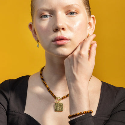 Pulsera con Ojo de Tigre acabado oro 18k - Lessy